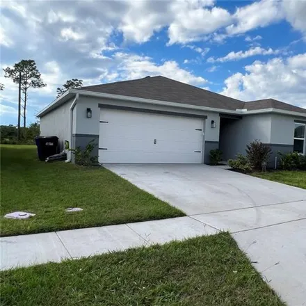 Rent this 3 bed house on Sweet Acres Place in Saint Cloud, FL