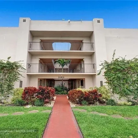 Buy this 2 bed condo on 5000 Bottlebrush Circle in County Club Acres, Palm Beach County