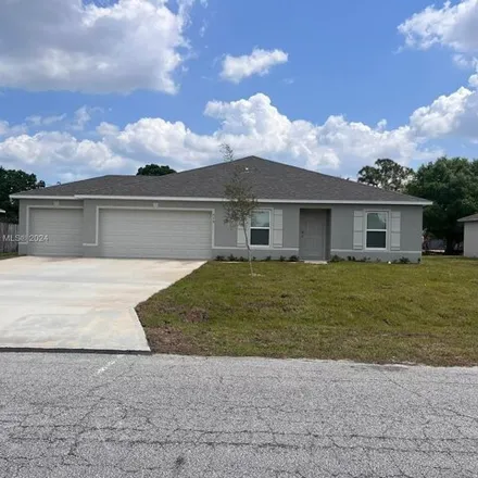 Rent this 4 bed house on 586 Northwest North Macedo Boulevard in Port Saint Lucie, FL 34983