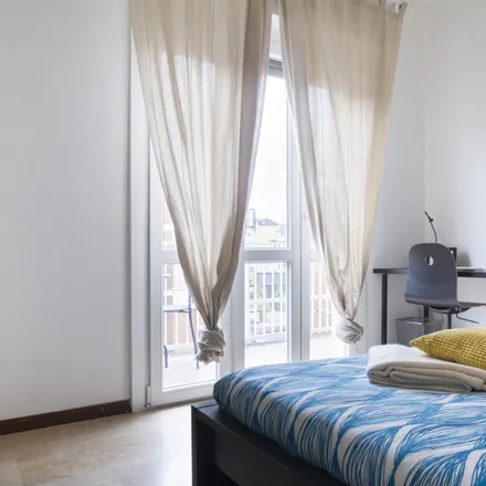 Rent this 4 bed room on Scarpamondo in Viale Carlo Espinasse, 20156 Milan MI
