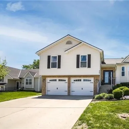 Buy this 4 bed house on 702 Holiday Drive in Lansing, KS 66043