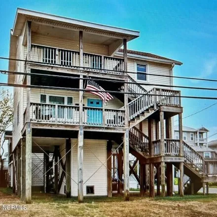 Buy this 4 bed house on 94 Sailfish Lane in Carolina Beach, NC 28428