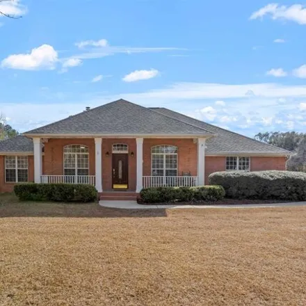 Buy this 4 bed house on 7929 Roberts Road in Leon County, FL 32309