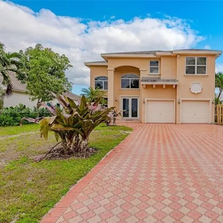 Buy this 4 bed house on 4492 Southwest 26th Avenue in Avon Park, Dania Beach