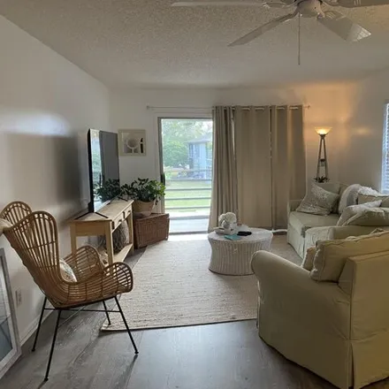 Rent this 2 bed condo on Lake Vista Trail in Saint Lucie County, FL 34952