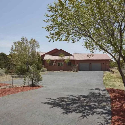 Buy this 3 bed house on 8 Zorrito Court in Santa Fe County, NM 87508