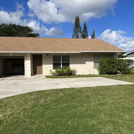 Rent this 3 bed house on 1895 Service Road in Juno Ridge, Palm Beach County