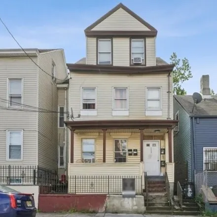 Buy this 8 bed house on 209 Butler Street in Paterson, NJ 07524