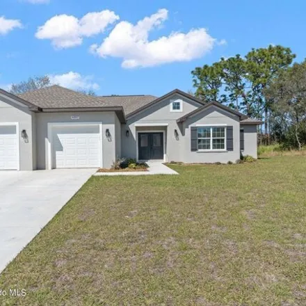 Buy this 3 bed house on 2473 Hawthorne Road in Spring Hill, FL 34609