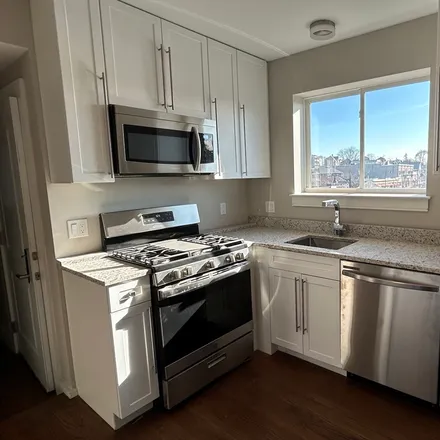 Rent this 4 bed apartment on 112 Broadway # 3