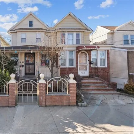 Buy this 3 bed house on 86-16 130th Street in New York, NY 11418