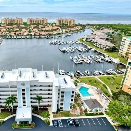Buy this 2 bed condo on Cape Cole Boulevard in Burnt Store Marina, Lee County