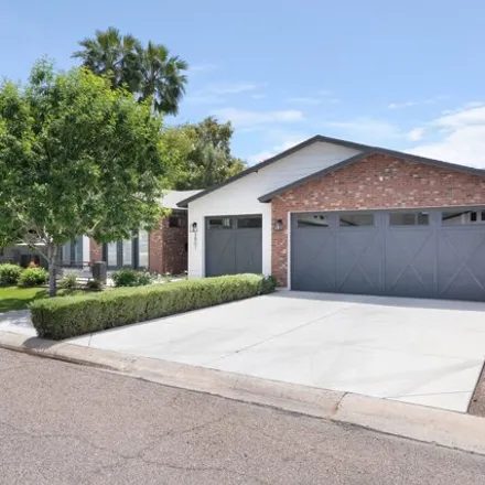 Buy this 4 bed house on 3801 East Heatherbrae Drive in Phoenix, AZ 85018