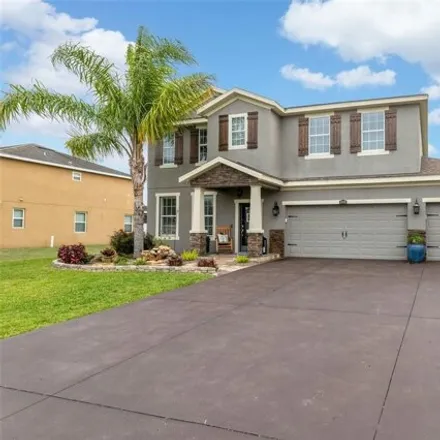 Buy this 4 bed house on 13435 Barkingside Place in Spring Hill, FL 34609