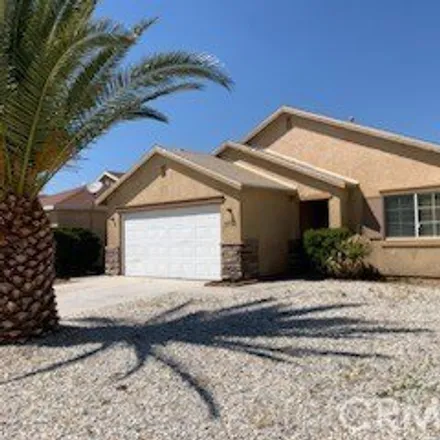 Rent this 4 bed house on 11750 Harwood Road in Victorville, CA 92392