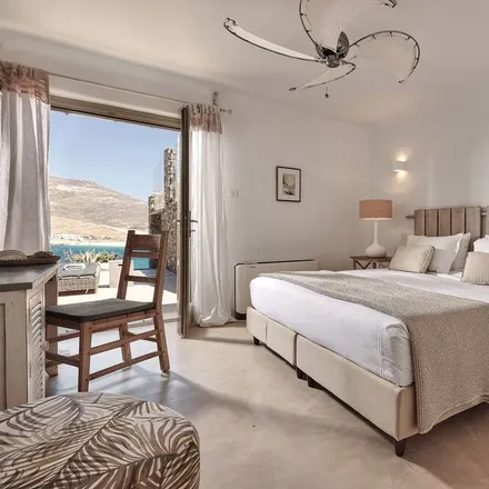 Rent this 6 bed house on National Bank of Greece in Melpos Aksioti, Mykonos