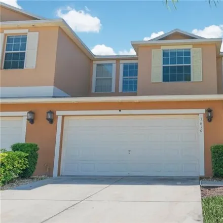 Buy this 4 bed townhouse on 3616 Rodrick Circle in Meadow Woods, Orange County