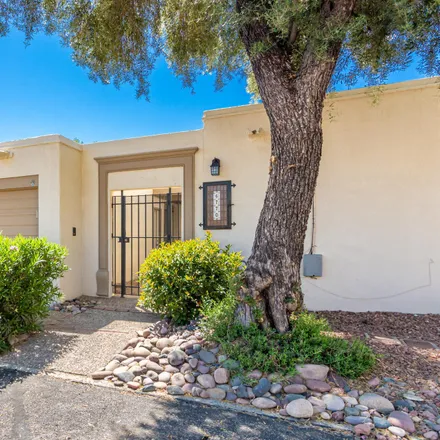 Buy this 3 bed townhouse on 6795 East Camino del Dorado in Tucson, AZ 85715
