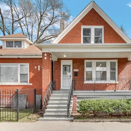 Buy this 4 bed house on 6619 South Saint Lawrence Avenue in Chicago, IL 60637