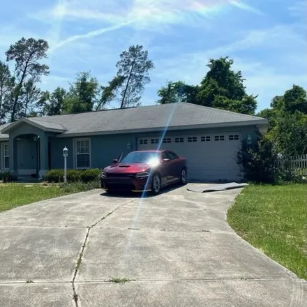 Buy this 3 bed house on 2760 Sw 146th Place Rd in Ocala, Florida