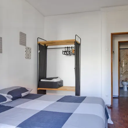 Rent this 4 bed room on Rua da Quintinha 70 in 1200-366 Lisbon, Portugal
