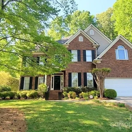 Buy this 4 bed house on 21337 Summerbrook Drive in Cornelius, NC 28031