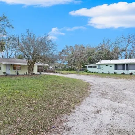 Buy this 2 bed house on FL 54 in Pasco County, FL 33541