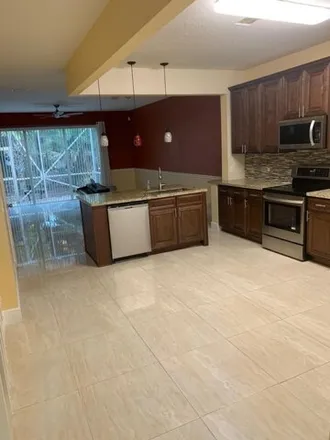 Rent this 3 bed house on 1114 Woodfield Road in Greenacres, FL 33415