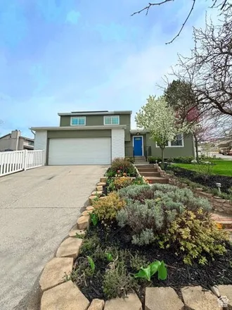 Buy this 4 bed house on 7289 3170 East in Cottonwood Heights, UT 84121