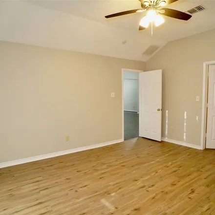 Rent this 4 bed apartment on 7013 Battle Creek Drive in Rowlett, TX 75089