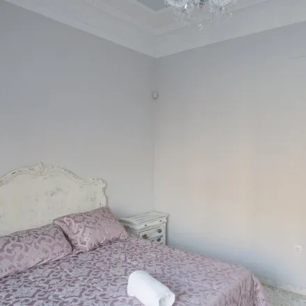 Rent this 12 bed room on Calle Nuestra Señora de la Paz in 41005 Seville, Spain