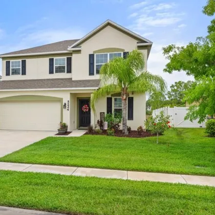 Buy this 4 bed house on 5222 Northwest Wisk Fern Circle in Port Saint Lucie, FL 34986