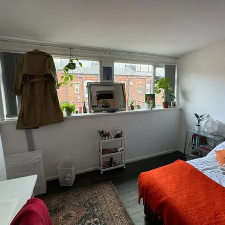 Rent this 4 bed townhouse on Park Lane in Leeds, LS3 1EF