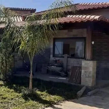 Buy this 8 bed house on Drogaria Araújo in Rua Acadêmico Nilo Figueiredo, Lagoa Santa - MG