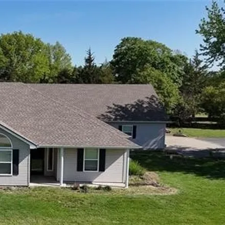 Buy this 4 bed house on 13979 Crystal Lake Drive in Vernon County, MO 64772