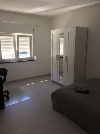 Rent this 4 bed room on RIDENT in Rua José Elias Garcia 27B, 2775-196 Parede