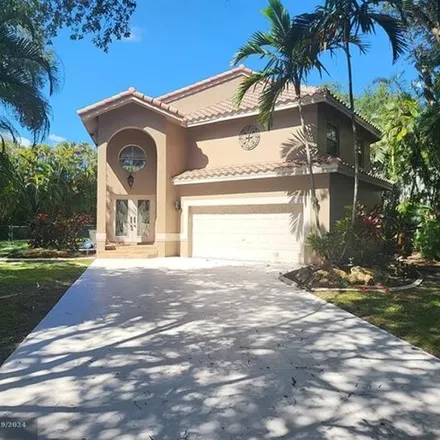 Rent this 4 bed house on 5811 Northwest 60th Street in Parkland, FL 33067