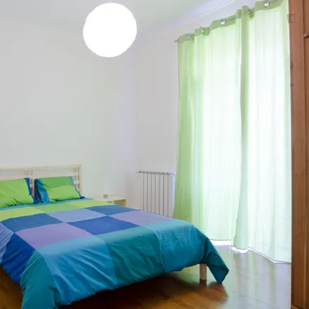 Rent this 6 bed room on Pali Baba in Rua Morais Soares, 1900-998 Lisbon