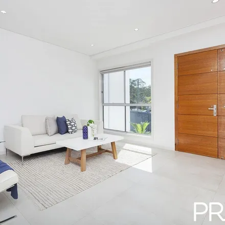 Rent this 5 bed apartment on Weston Street in Panania NSW 2213, Australia
