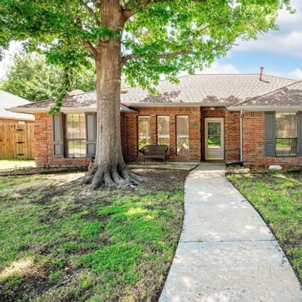 Buy this 3 bed house on 1717 Big Canyon Trail in Carrollton, TX 75007