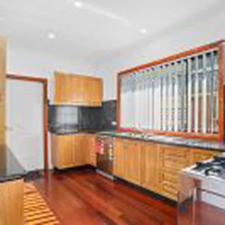 Rent this 4 bed townhouse on Arkell Drive in Figtree NSW 2525, Australia