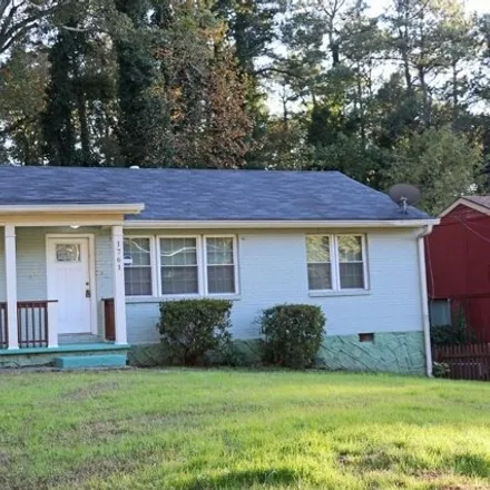 Rent this 3 bed house on 1759 Terry Mill Road Southeast in Candler-McAfee, GA 30316