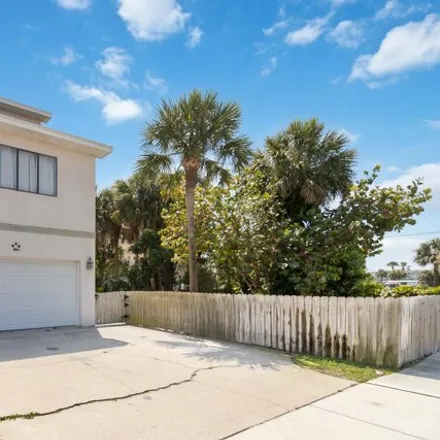 Buy this 3 bed house on 512 Tyler Avenue in Cape Canaveral, FL 32920