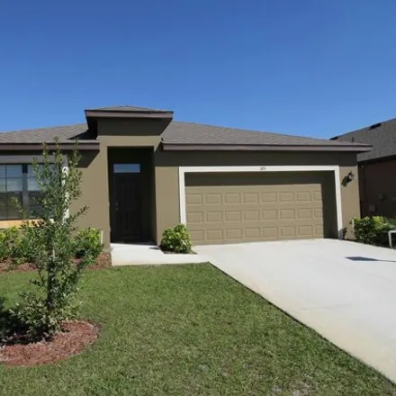 Rent this 4 bed house on Bubbling Lane Northwest in Palm Bay, FL 32908