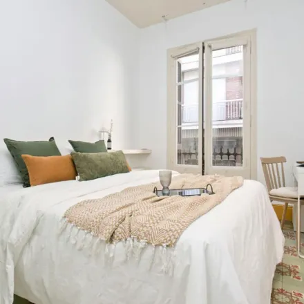 Rent this 7 bed apartment on Carrer d'Homer in 08001 Barcelona, Spain