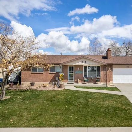 Buy this 4 bed house on 4299 Mignon Drive in West Valley City, UT 84120