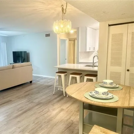 Rent this 2 bed condo on Colonnades Court East in Pelican Landing, Bonita Springs