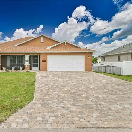 Buy this 3 bed house on 4012 Northeast 22nd Avenue in Cape Coral, FL 33909