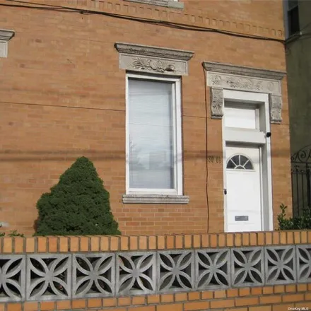 Buy this 4 bed house on 30-01 34th Avenue in New York, NY 11106