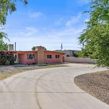 Buy this 4 bed house on 8745 E Old Spanish Trl in Tucson, Arizona